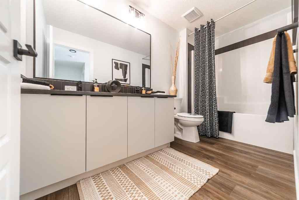 MLS® A2237133 - 405 Sora Way SE in Hotchkiss Calgary, Residential