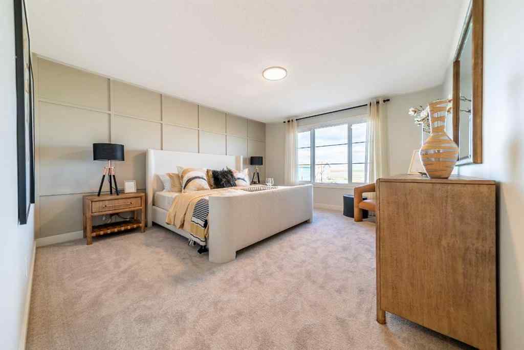 MLS® A2237133 - 405 Sora Way SE in Hotchkiss Calgary, Residential