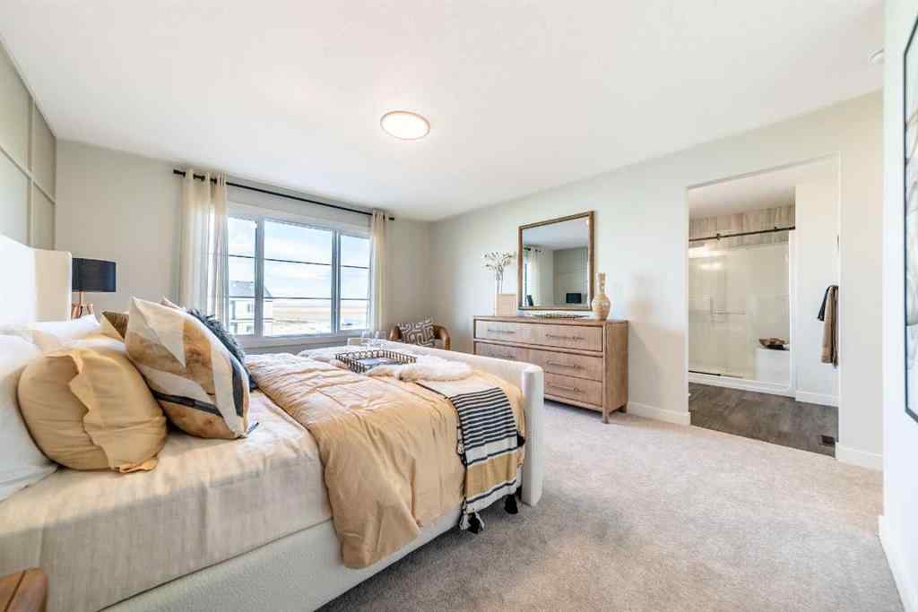 MLS® A2237133 - 405 Sora Way SE in Hotchkiss Calgary, Residential