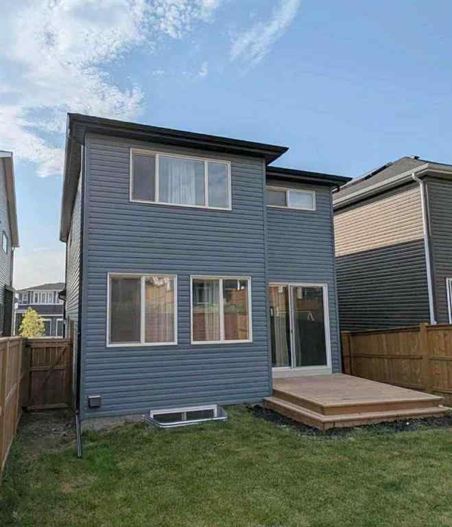 MLS® A2237148 - 336 Lucas Way NW in Livingston Calgary, Residential