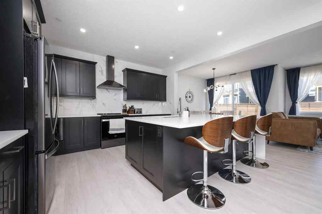 MLS® A2237148 - 336 Lucas Way NW in Livingston Calgary, Residential