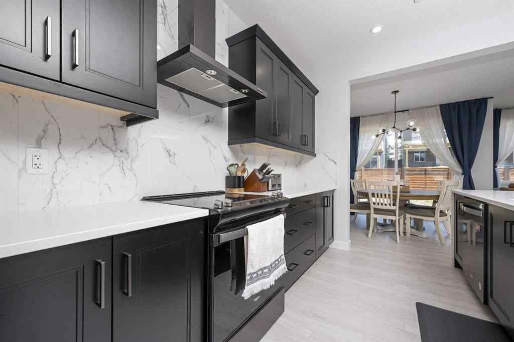 MLS® A2237148 - 336 Lucas Way NW in Livingston Calgary, Residential
