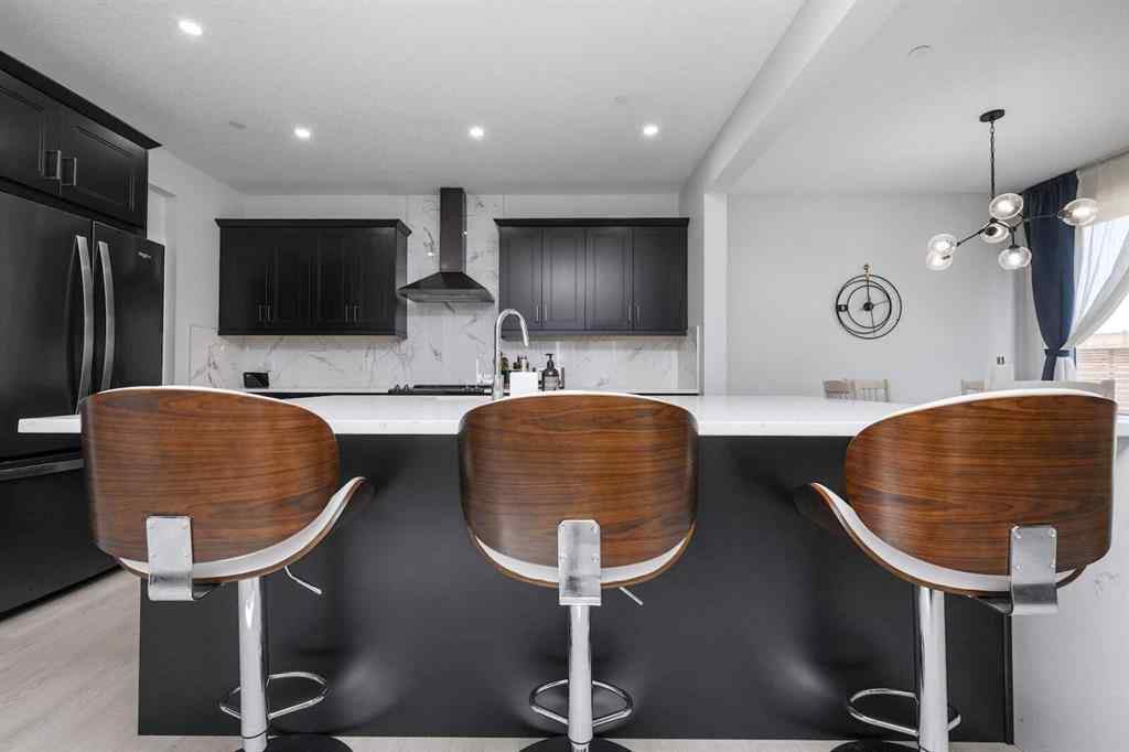 MLS® A2237148 - 336 Lucas Way NW in Livingston Calgary, Residential