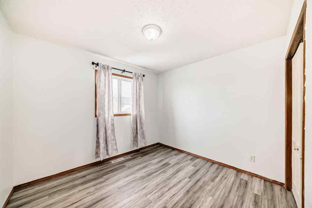MLS® A2237152 - 52 Saddleback Way NE in Saddle Ridge Calgary, Residential