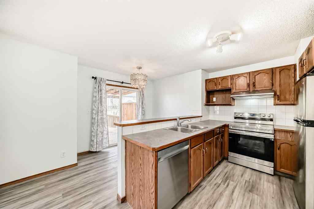 MLS® A2237152 - 52 Saddleback Way NE in Saddle Ridge Calgary, Residential