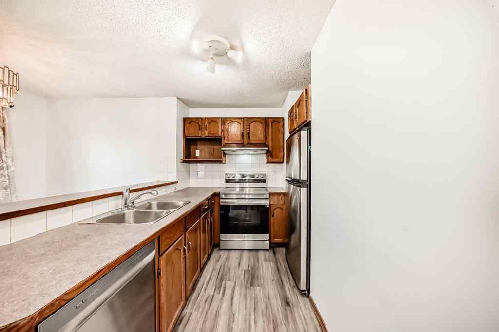 MLS® A2237152 - 52 Saddleback Way NE in Saddle Ridge Calgary, Residential