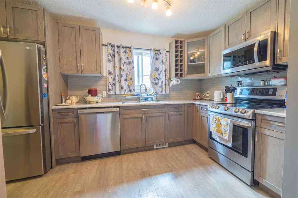 MLS® A2237259 - 105 Deer Ridge Lane SE in Deer Run Calgary, Residential