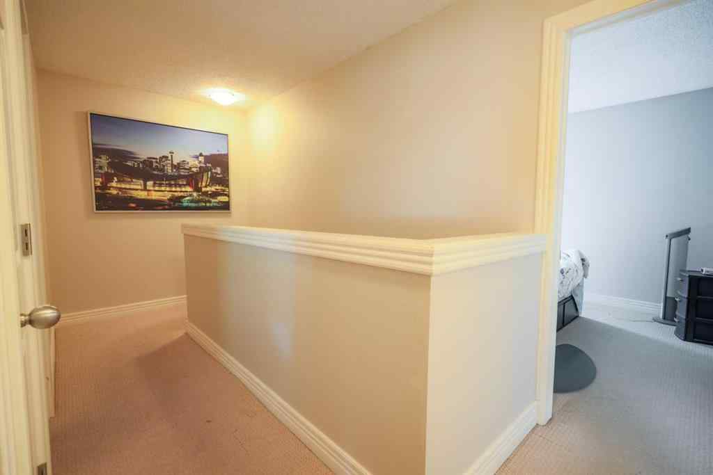 MLS® A2237259 - 105 Deer Ridge Lane SE in Deer Run Calgary, Residential