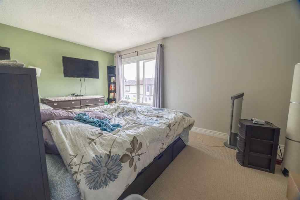 MLS® A2237259 - 105 Deer Ridge Lane SE in Deer Run Calgary, Residential