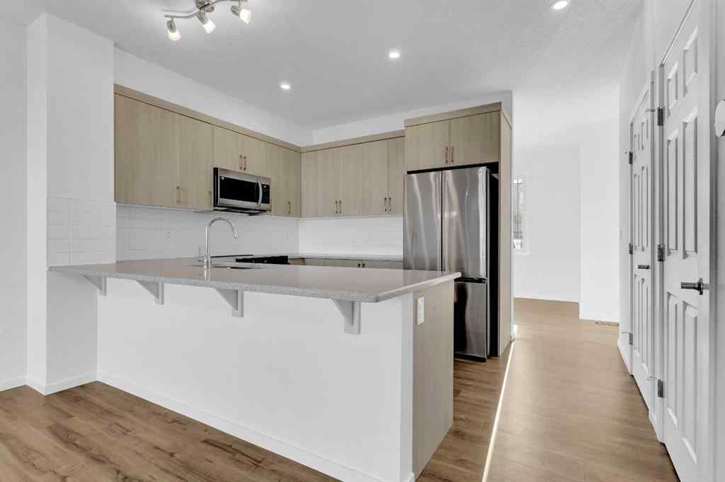 MLS® A2237271 - 71 Carringford Road NW in Carrington Calgary, Residential