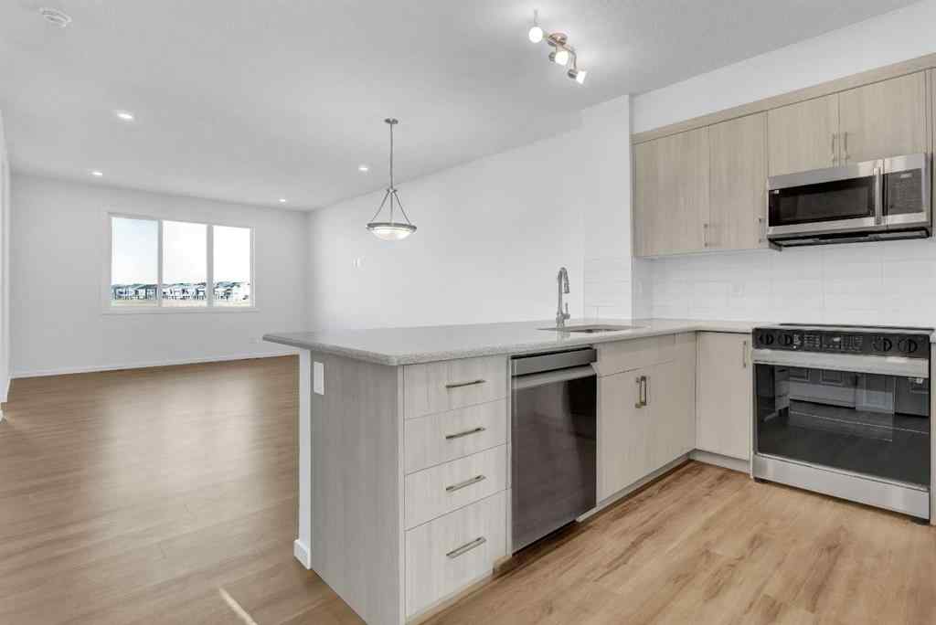 MLS® A2237271 - 71 Carringford Road NW in Carrington Calgary, Residential