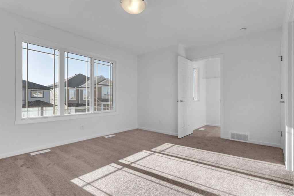 MLS® A2237271 - 71 Carringford Road NW in Carrington Calgary, Residential