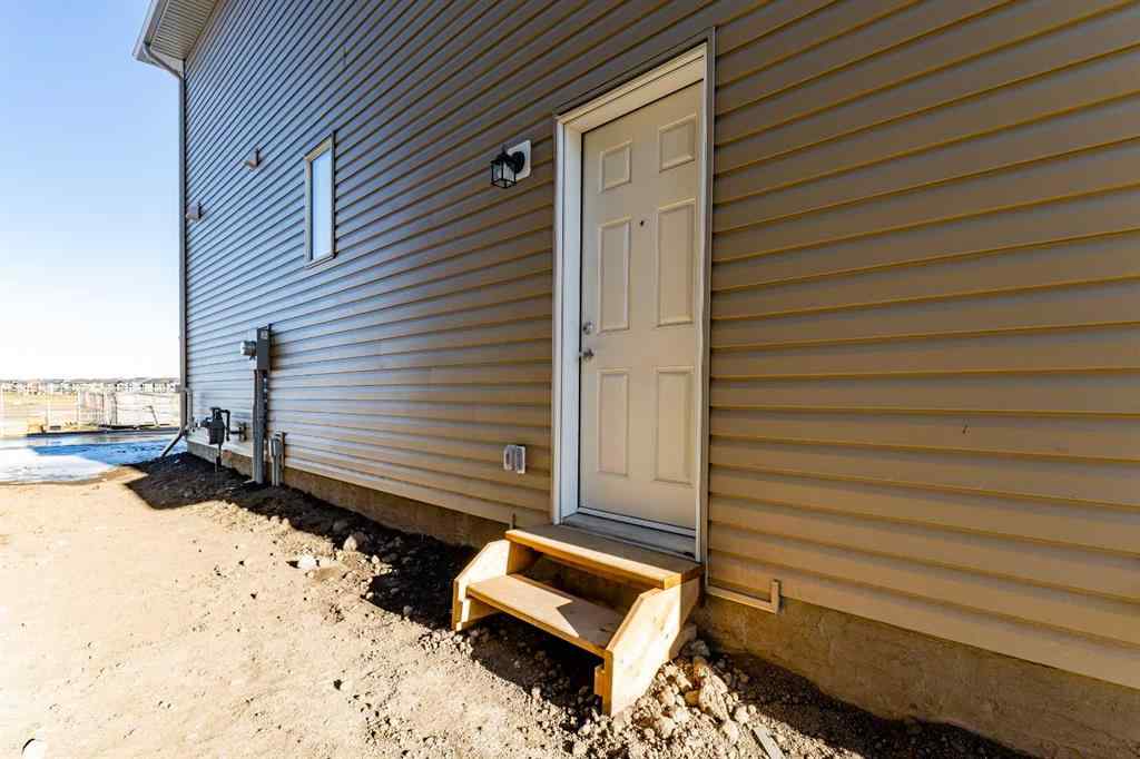 MLS® A2237271 - 71 Carringford Road NW in Carrington Calgary, Residential