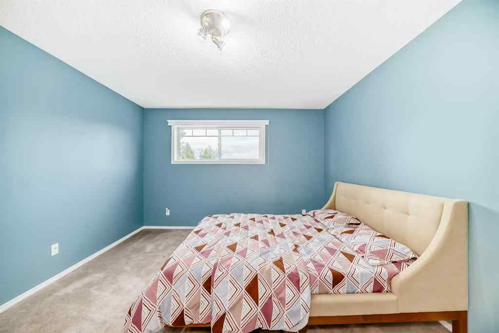 MLS® A2237285 - 128 Millview Green SW in Millrise Calgary, Residential