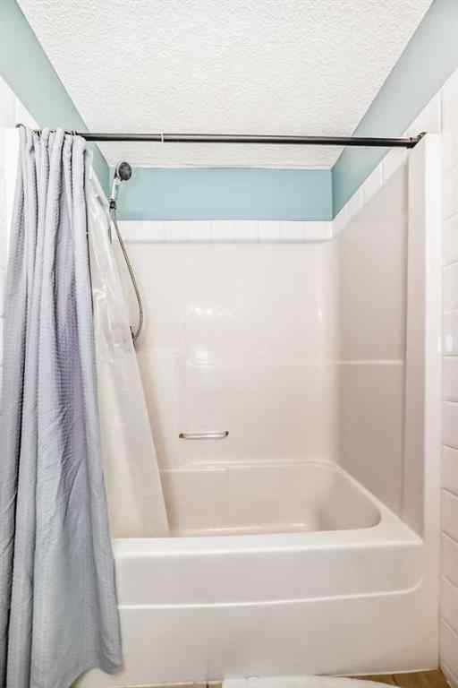 MLS® A2237285 - 128 Millview Green SW in Millrise Calgary, Residential