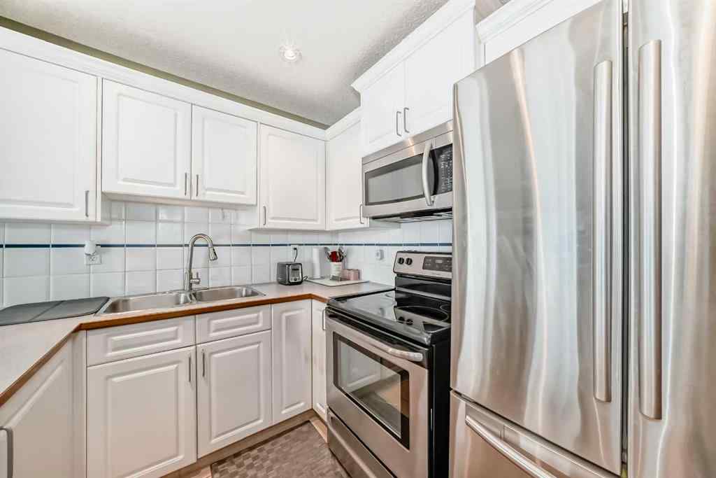 MLS® A2237285 - 128 Millview Green SW in Millrise Calgary, Residential