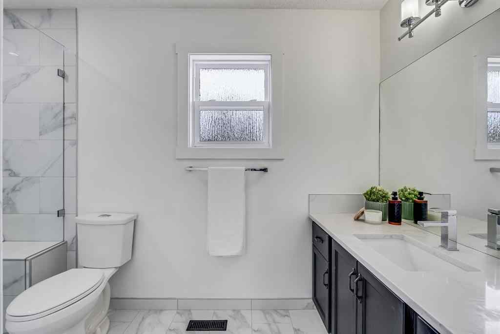 MLS® A2237338 - 202 Shawinigan Way SW in Shawnessy Calgary, Residential