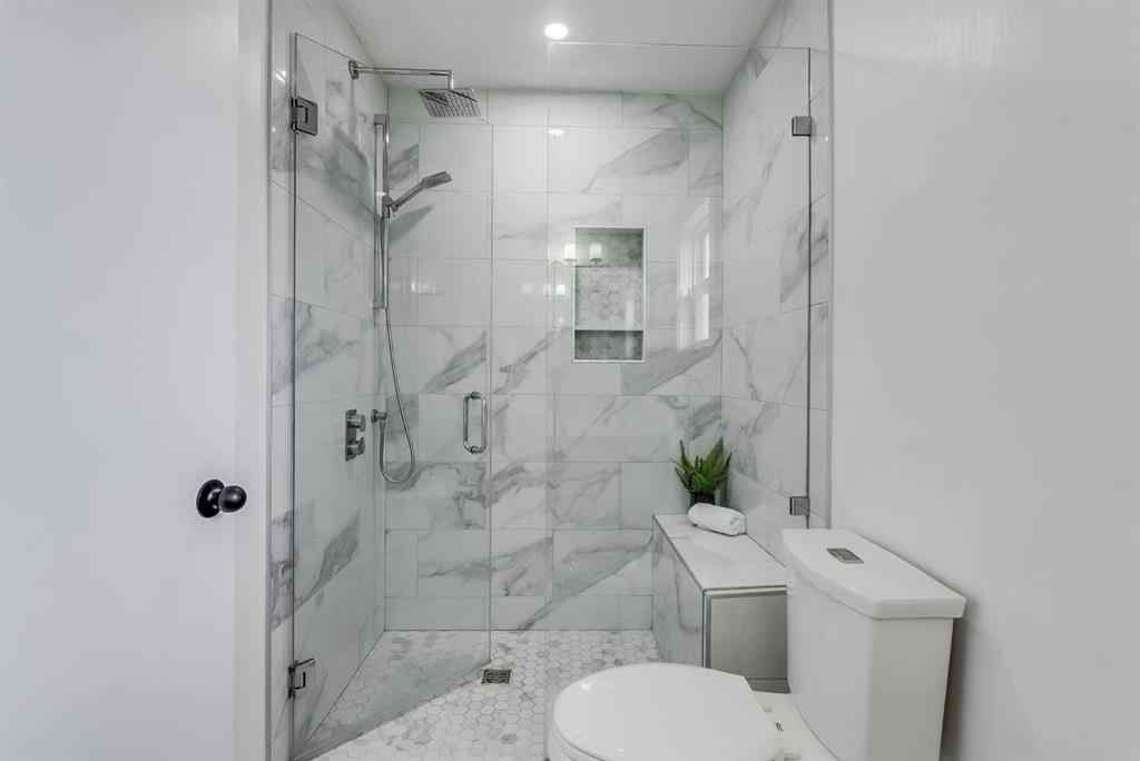 MLS® A2237338 - 202 Shawinigan Way SW in Shawnessy Calgary, Residential