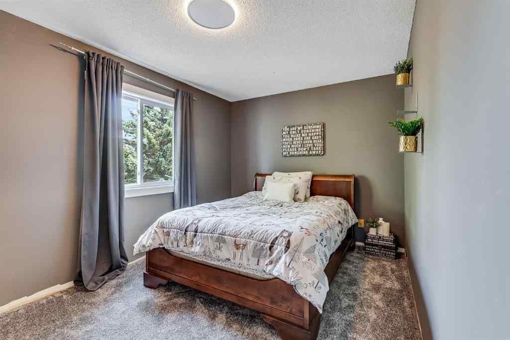 MLS® A2237338 - 202 Shawinigan Way SW in Shawnessy Calgary, Residential