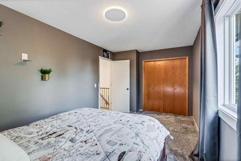 MLS® A2237338 - 202 Shawinigan Way SW in Shawnessy Calgary, Residential
