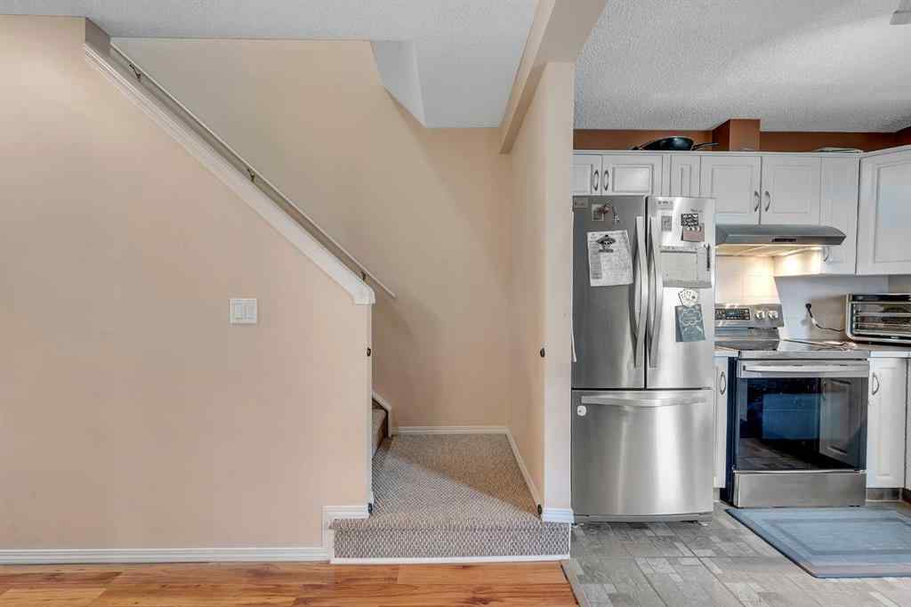 MLS® A2237370 - Unit #13 200 Hidden Hills Terrace NW in Hidden Valley Calgary, Residential