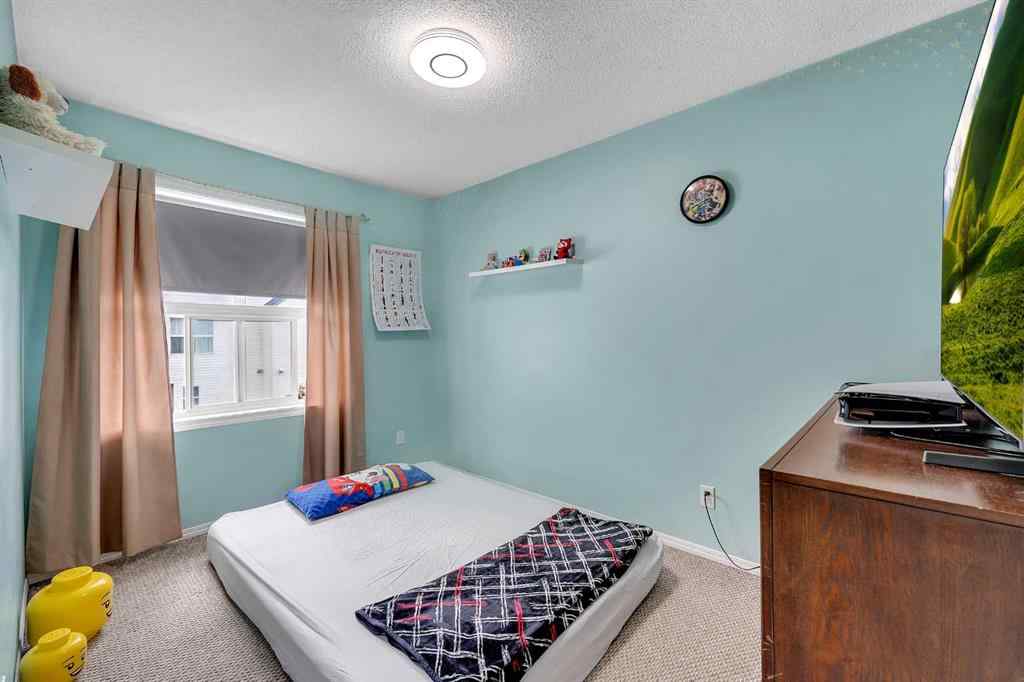 MLS® A2237370 - Unit #13 200 Hidden Hills Terrace NW in Hidden Valley Calgary, Residential