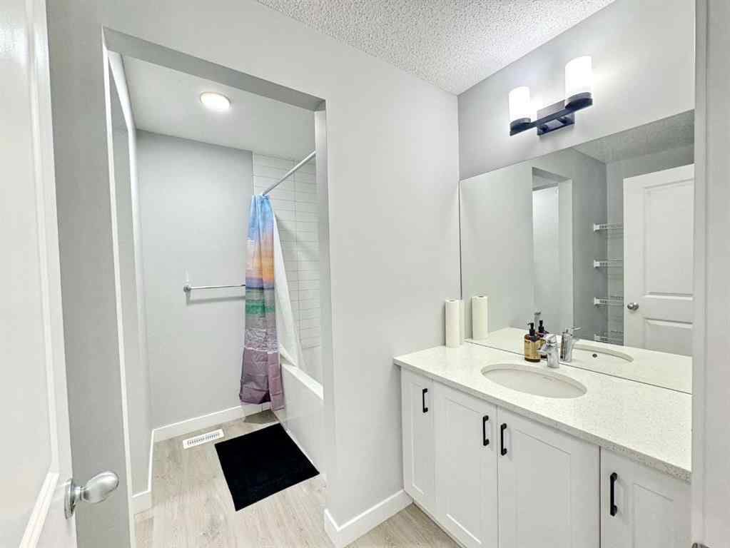 MLS® A2237405 - 14 Sundown Close  in Sunset Ridge Cochrane, Residential