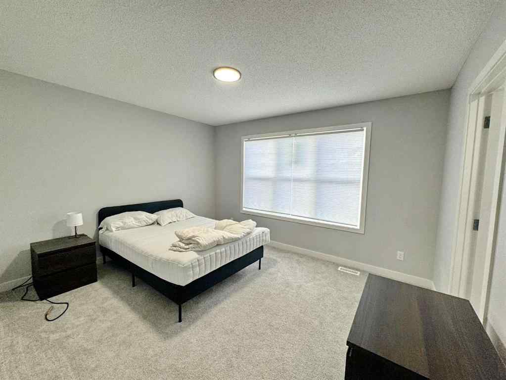MLS® A2237405 - 14 Sundown Close  in Sunset Ridge Cochrane, Residential