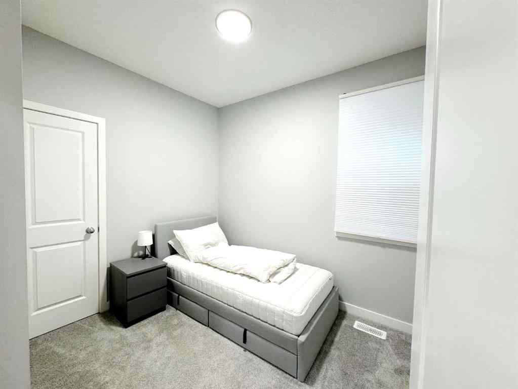 MLS® A2237405 - 14 Sundown Close  in Sunset Ridge Cochrane, Residential