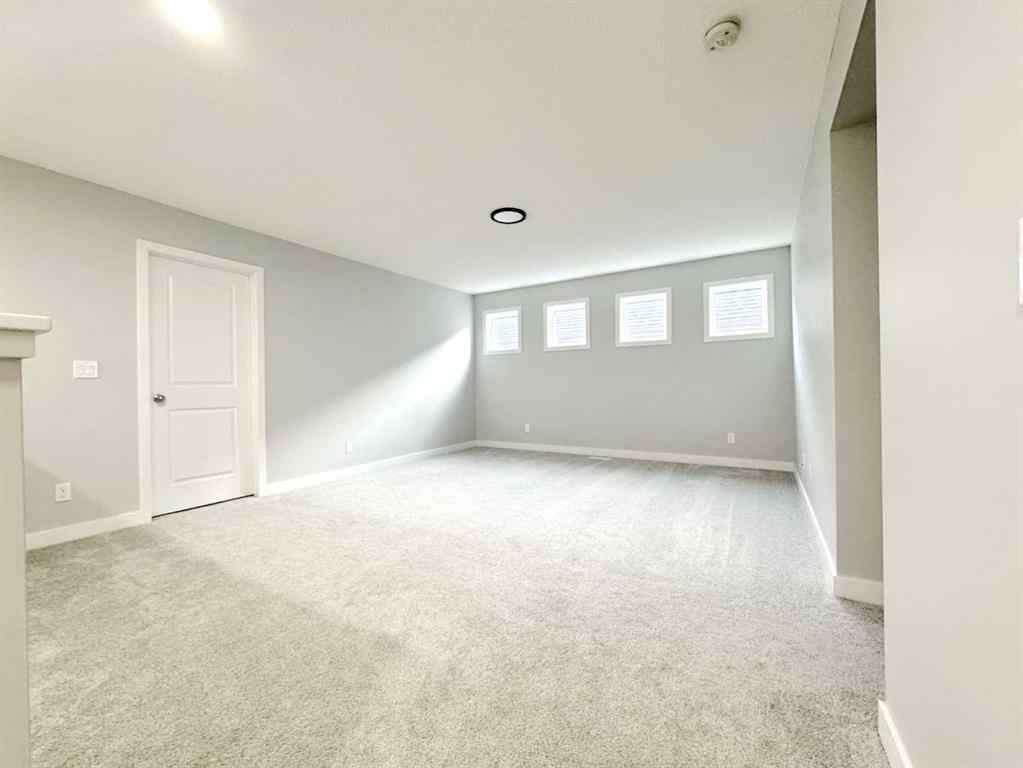 MLS® A2237405 - 14 Sundown Close  in Sunset Ridge Cochrane, Residential