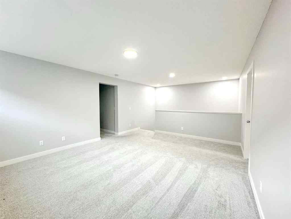 MLS® A2237405 - 14 Sundown Close  in Sunset Ridge Cochrane, Residential