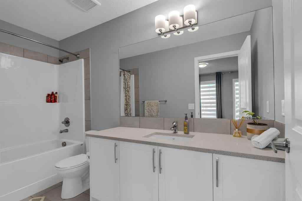 MLS® A2237447 - 240 Lucas Crescent NW in Livingston Calgary, Residential