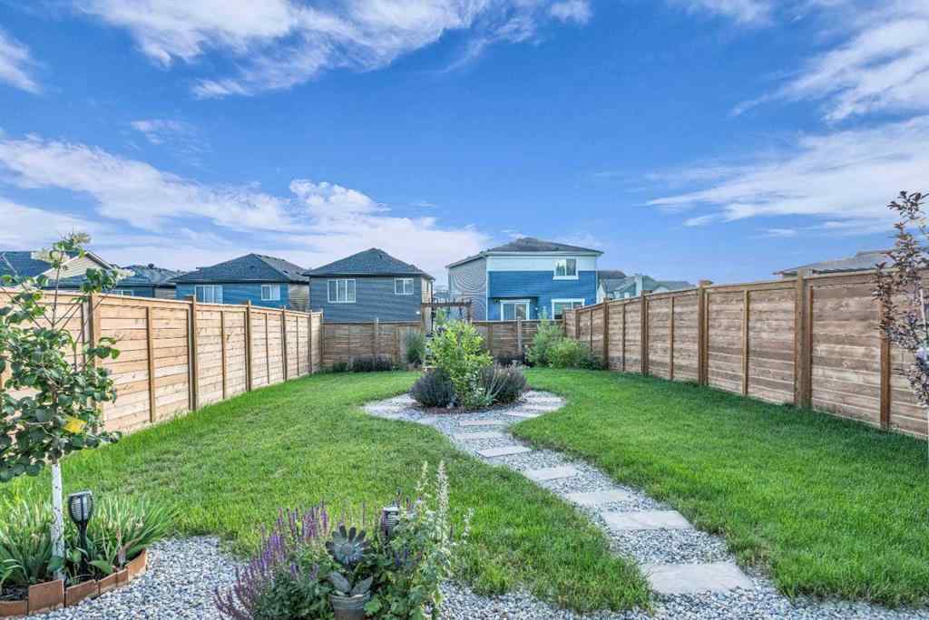 MLS® A2237447 - 240 Lucas Crescent NW in Livingston Calgary, Residential
