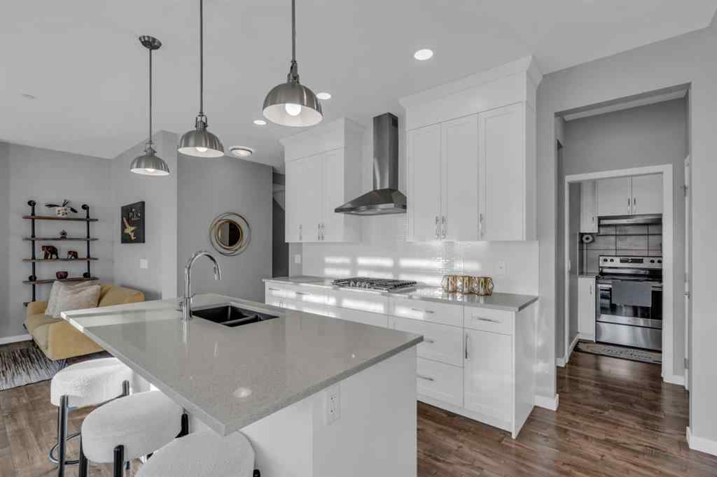 MLS® A2237447 - 240 Lucas Crescent NW in Livingston Calgary, Residential