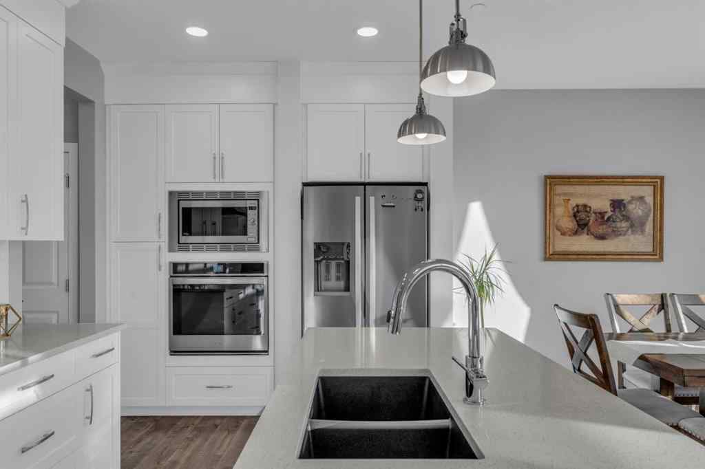 MLS® A2237447 - 240 Lucas Crescent NW in Livingston Calgary, Residential