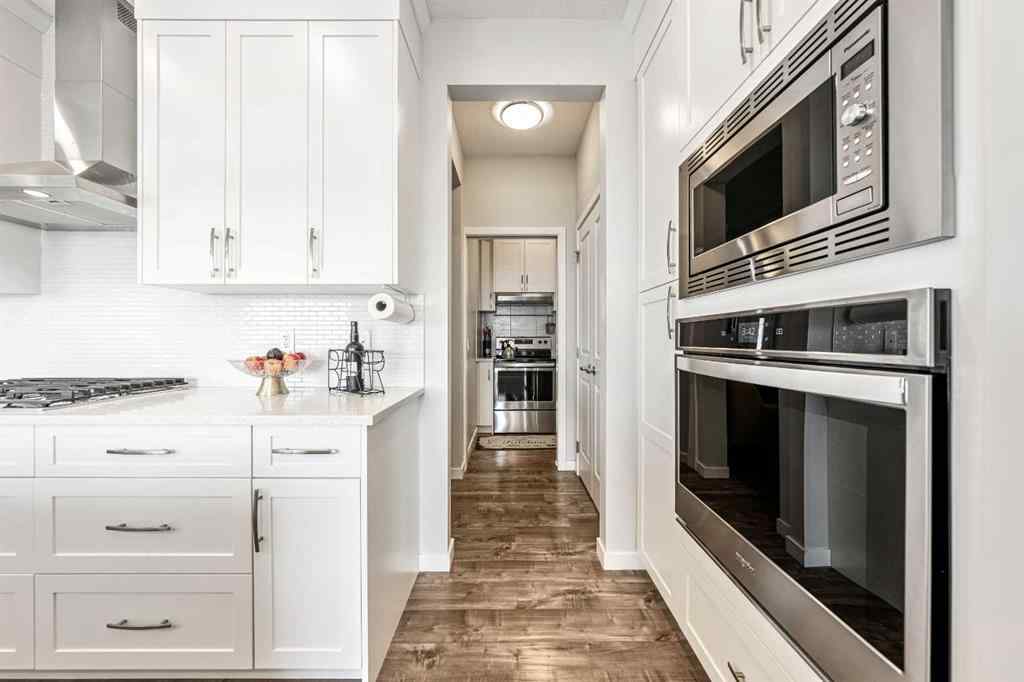MLS® A2237447 - 240 Lucas Crescent NW in Livingston Calgary, Residential