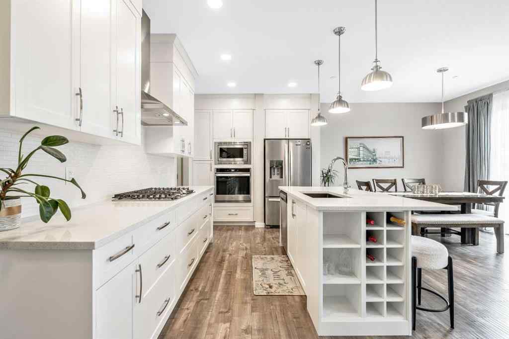 MLS® A2237447 - 240 Lucas Crescent NW in Livingston Calgary, Residential