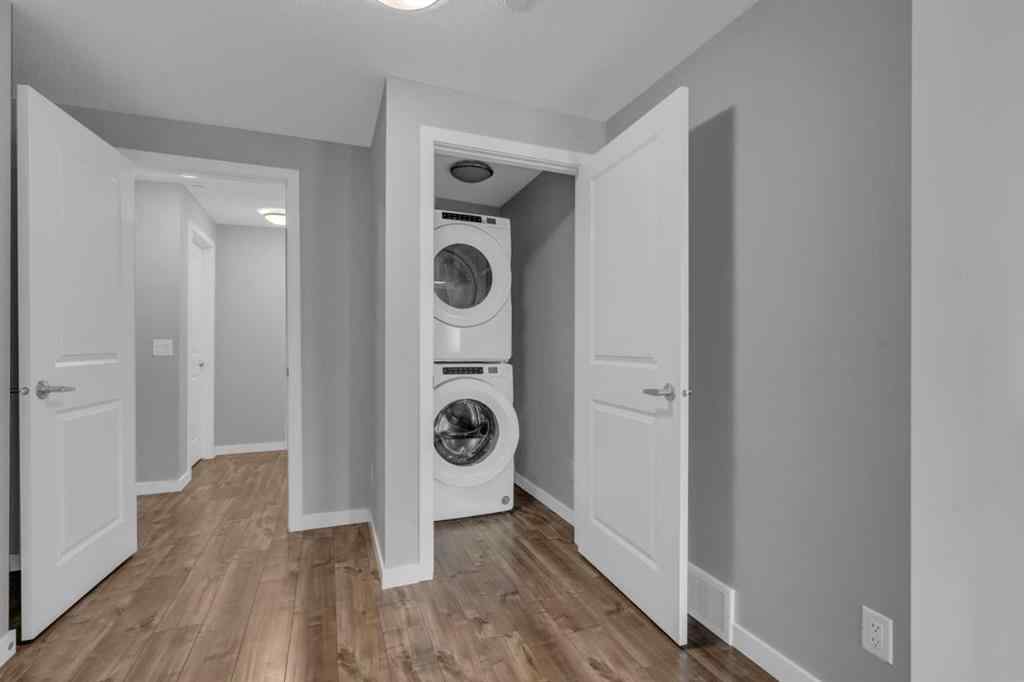 MLS® A2237447 - 240 Lucas Crescent NW in Livingston Calgary, Residential
