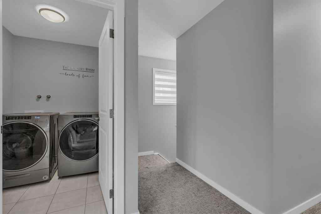 MLS® A2237447 - 240 Lucas Crescent NW in Livingston Calgary, Residential
