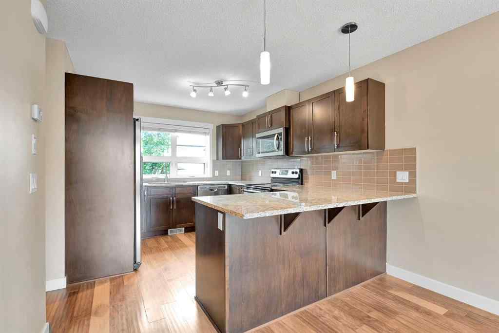 MLS® A2237483 - 410 Covecreek Circle NE in Coventry Hills Calgary, Residential
