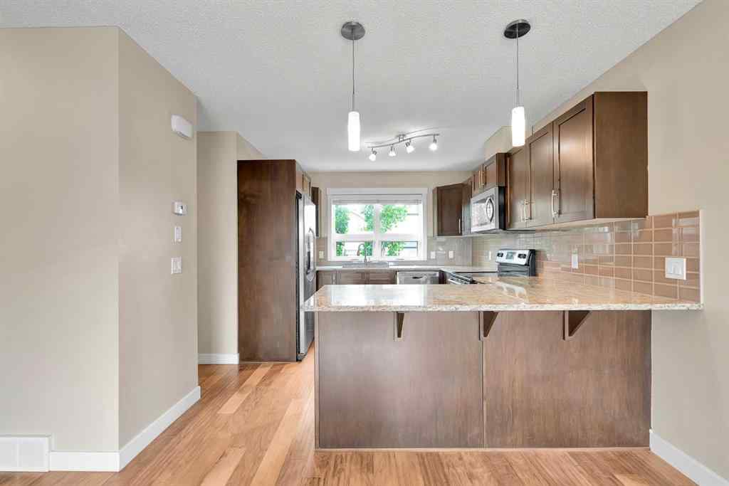 MLS® A2237483 - 410 Covecreek Circle NE in Coventry Hills Calgary, Residential