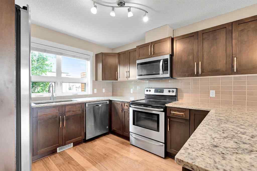 MLS® A2237483 - 410 Covecreek Circle NE in Coventry Hills Calgary, Residential