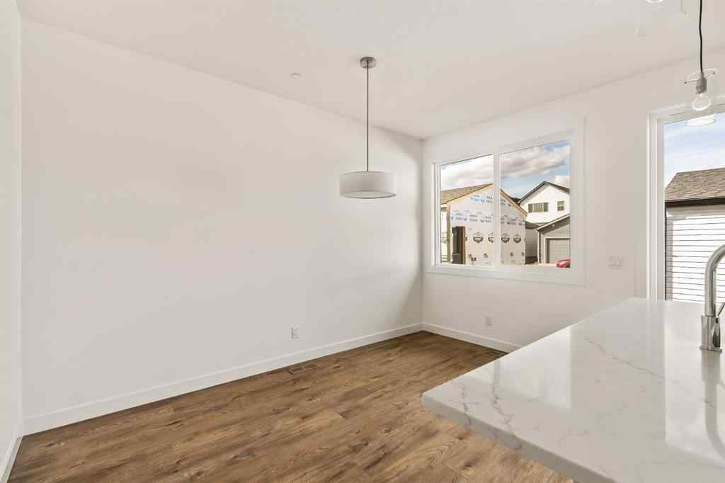 MLS® A2237515 - 47 Herron Walk NE in Livingston Calgary, Residential