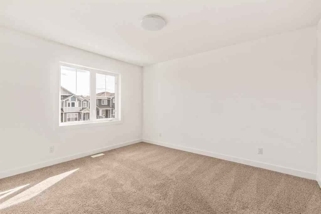 MLS® A2237515 - 47 Herron Walk NE in Livingston Calgary, Residential