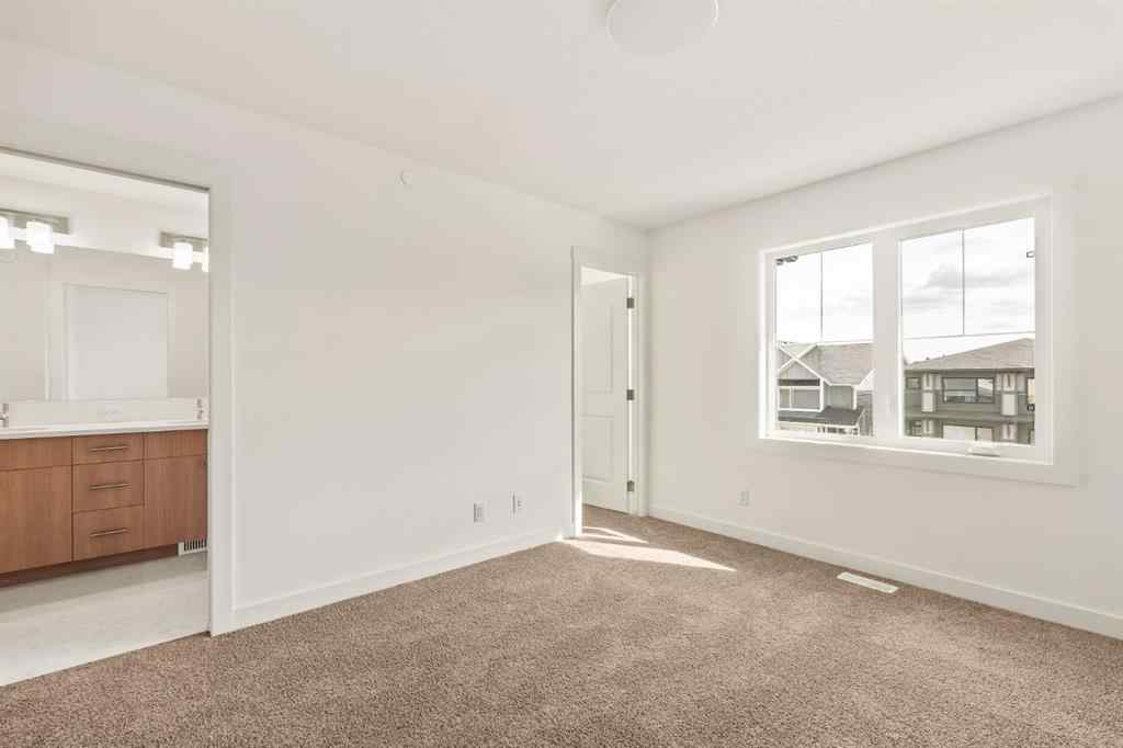 MLS® A2237515 - 47 Herron Walk NE in Livingston Calgary, Residential