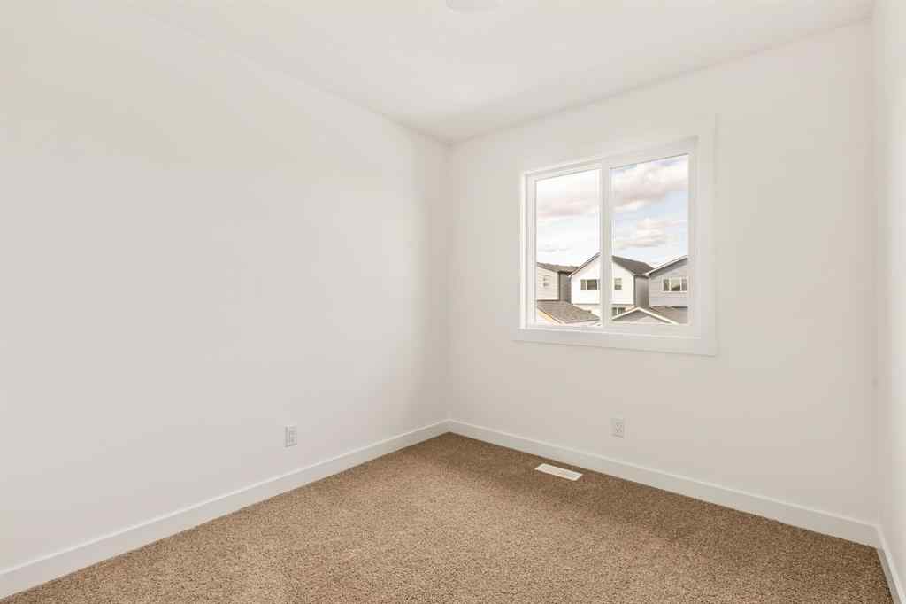 MLS® A2237515 - 47 Herron Walk NE in Livingston Calgary, Residential