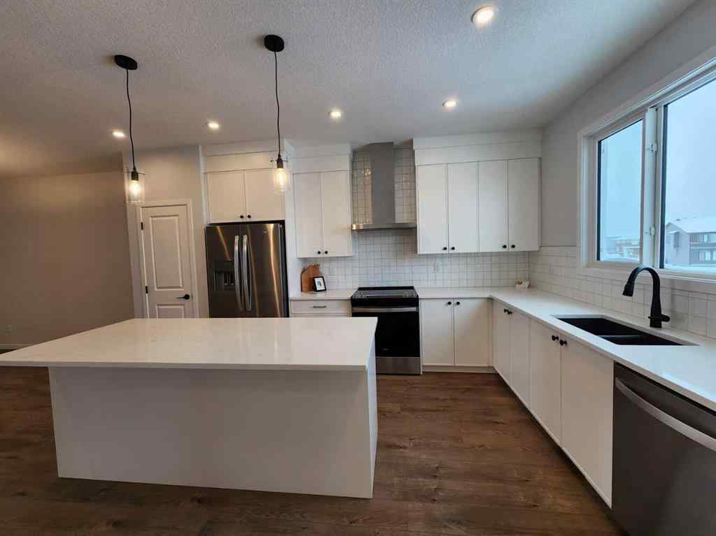 MLS® A2237555 - 575 Lucas Boulevard NW in Livingston Calgary, Residential