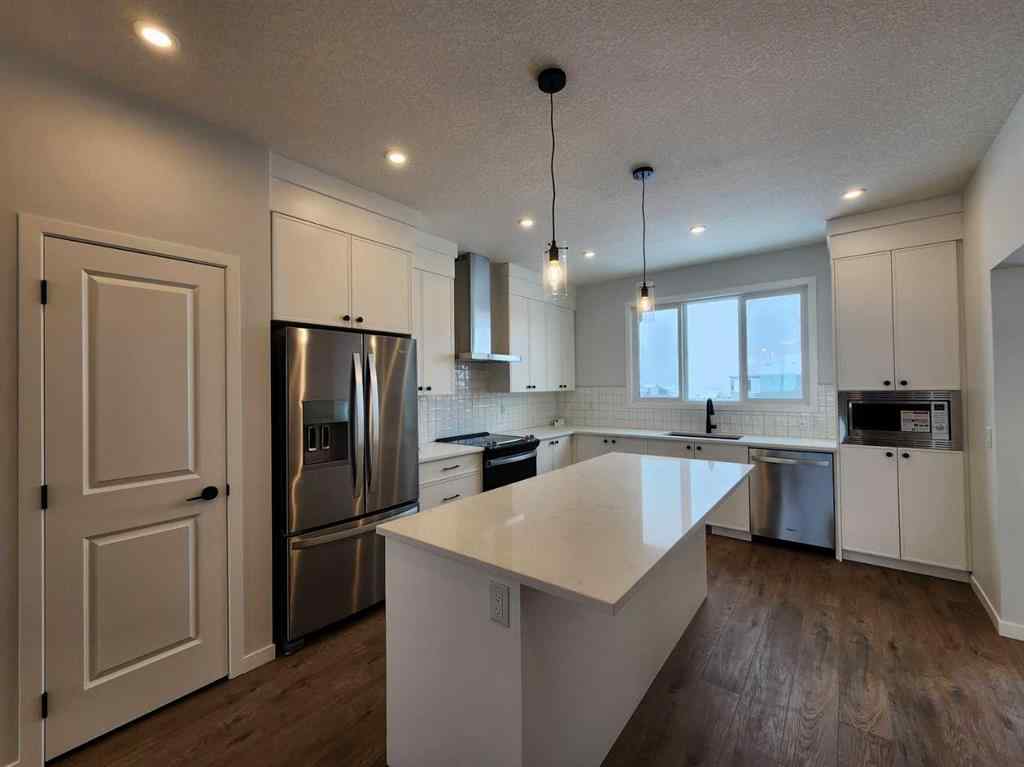MLS® A2237555 - 575 Lucas Boulevard NW in Livingston Calgary, Residential