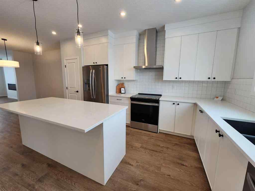 MLS® A2237555 - 575 Lucas Boulevard NW in Livingston Calgary, Residential
