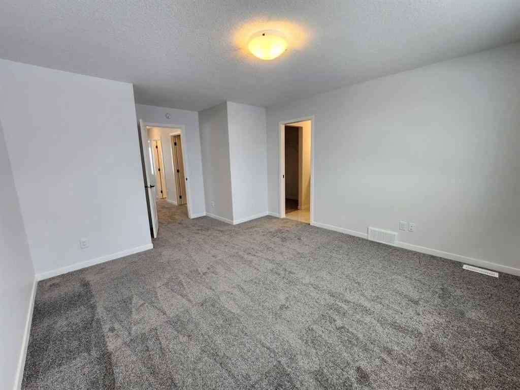 MLS® A2237555 - 575 Lucas Boulevard NW in Livingston Calgary, Residential